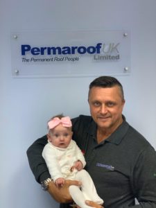 Adrian Buttress MD of Permaroof with his grandaughter River