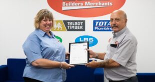 Kirstie Hackett Transport and HS Manager Administrator receiving her award from her line manager Andy Bunston Transport and HS Manager
