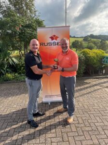 Trophy winner at Russell Roof Tiles annual charity golf tournament 2021