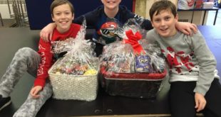 Year 6 pupils from Homefield Primary School with Scott Parnells hamper donations